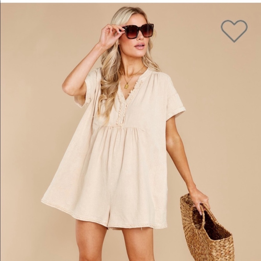 Cream romper with pockets